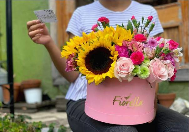 Florist arranging a sympathy wreath